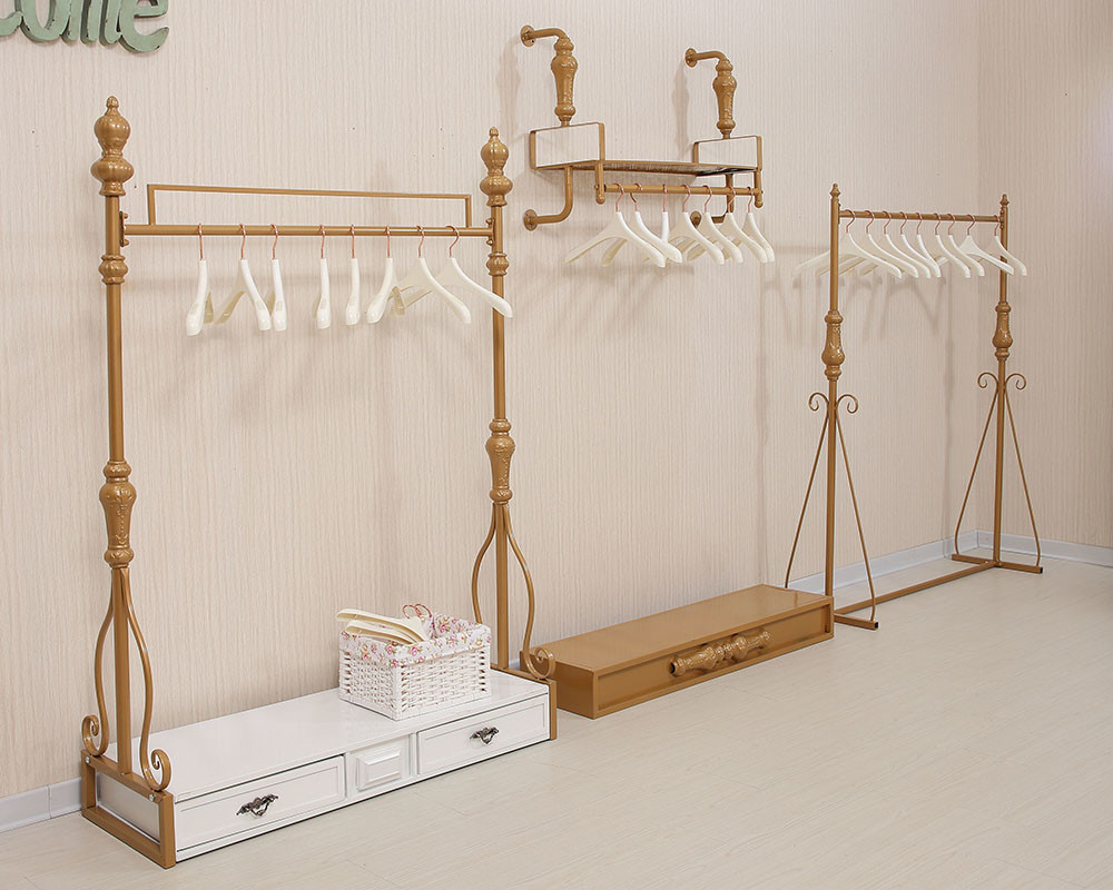 Women Clothing Store Shelves / Retail Clothing Display Systems Golden Color